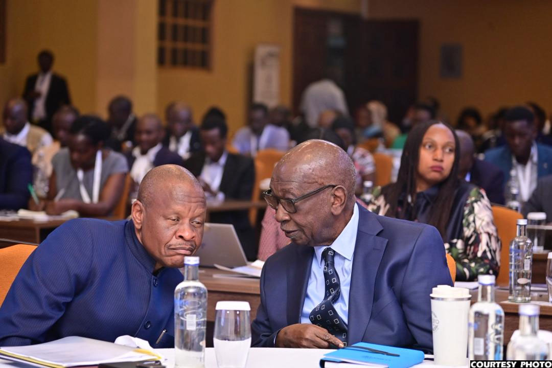 Trade state minister Gen Mbasu (left) and trade minister Mwebesa (right) on the opening day of the conference