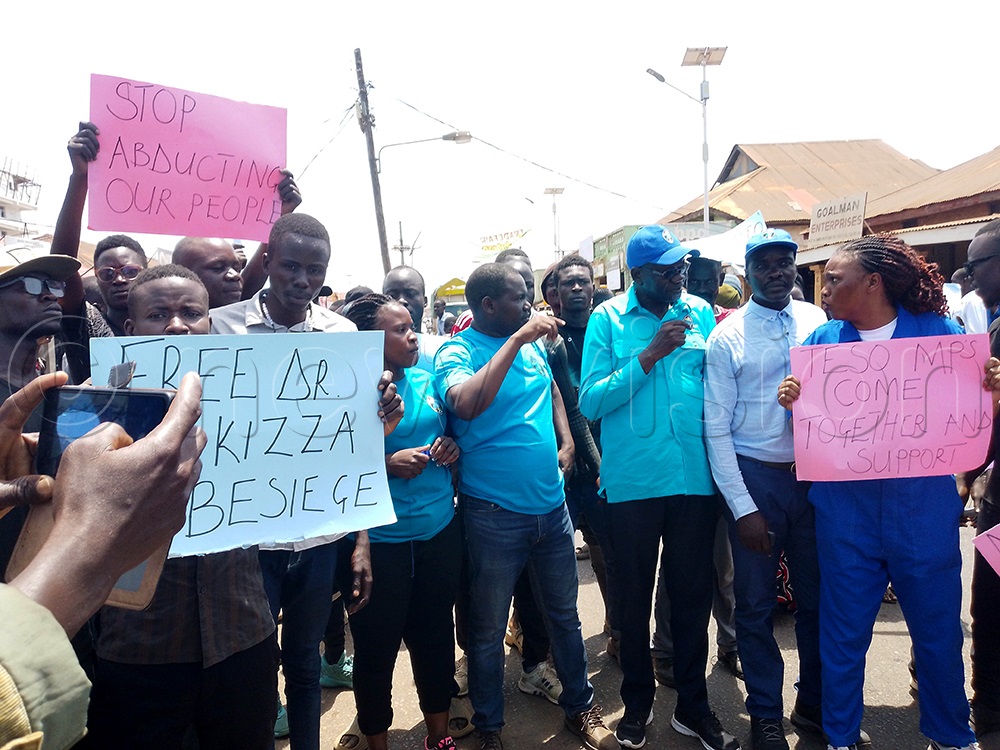 FDC president Patrick Oboi Amuriat flanked by Gweri County MP Tom Julius Ekudo, Soroti City Woman MP Joan Alobo and Soroti West MP Jonathan Ebwalu during the demonstration. (Photo by Godfrey Ojore)