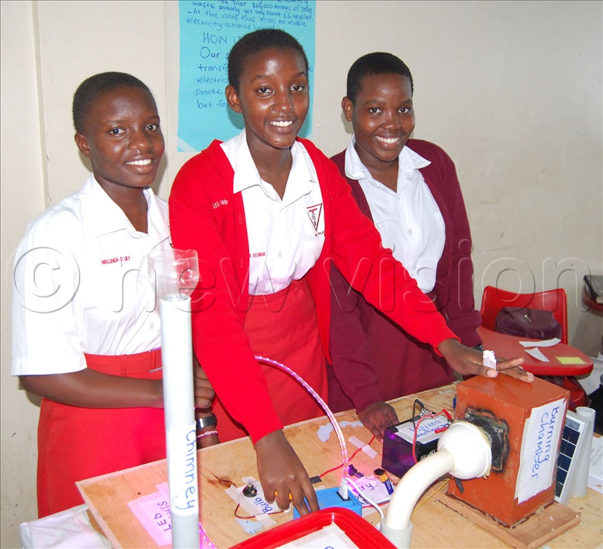 The students from Tricona's Chemistry Department at their waste-paper electricity- generating proto-type.
