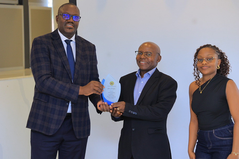 Permanent Secretary, Mr Bagiire Vincent Waiswa with Amb. Elly Kamahungye. (Courtesy)