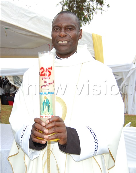 Fr Dr David Ssenkaayi during a procession for his 25th priestly anniversary thanksgiving mass at his parents' home at Nsangwa-Mawokota, Mpigi district on Saturday, February 8, 2025. (Credit: Mathias Mazinga)