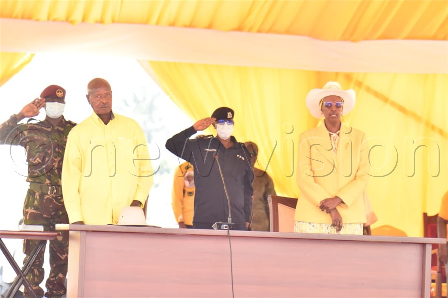 The President and First Lady during the singing of anthems.