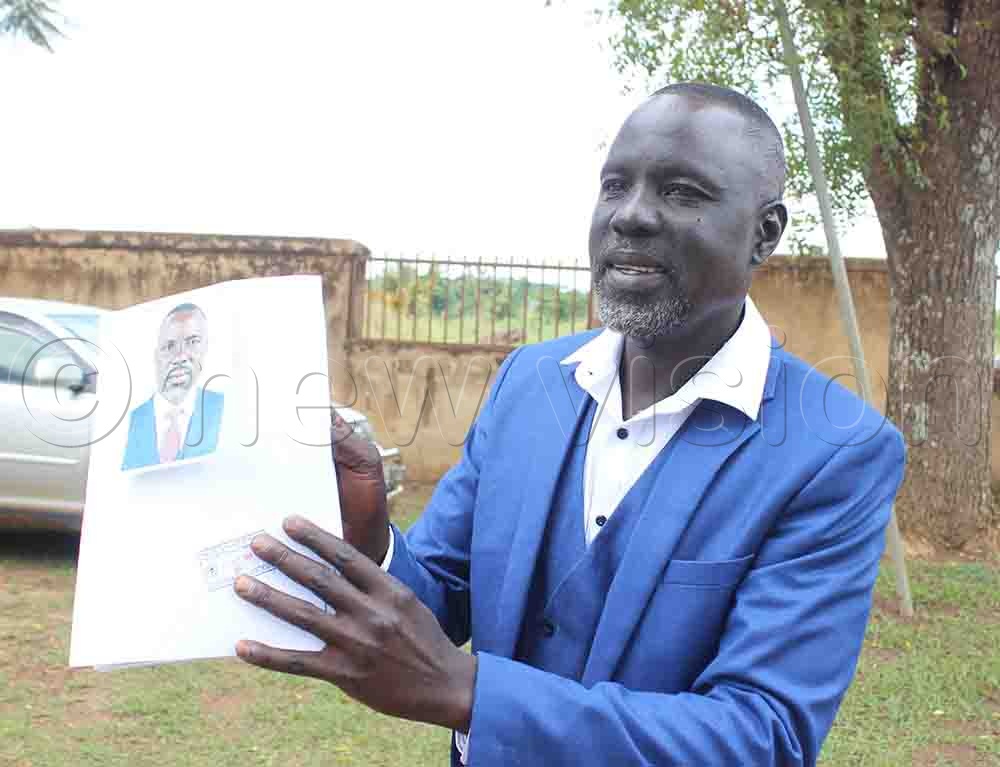 Luben Melvin Eputu was nominated as an independent candidate for Ochero county MP seat in Kaberamaido district with his nomination forms after being nominated. (Credit: Michael Onyige)