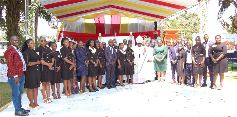 photo moment with some of the youth  leaders in Kampala Archdiocese who graced the function. 
