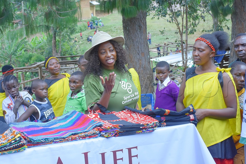 Christine Katushabe (left), the founder of Change A Life Bwindi, a non-profit-making organisation that strives to restore the ecology of the Bwindi landscape as well as peoples welfare. (Photo by Julius Luwemba)