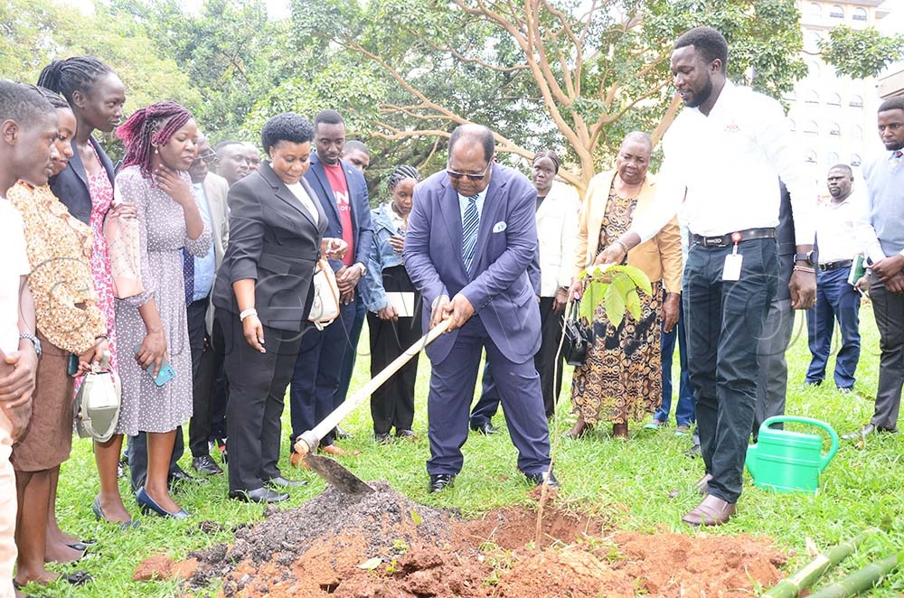 The former Chief Justice Benjamin Odoki planting a tree at Constitutional Square in Kampala at the commemoration of 30 years of constitutionalism on Tuesday (Credit: Isaac Nuwagaba)
