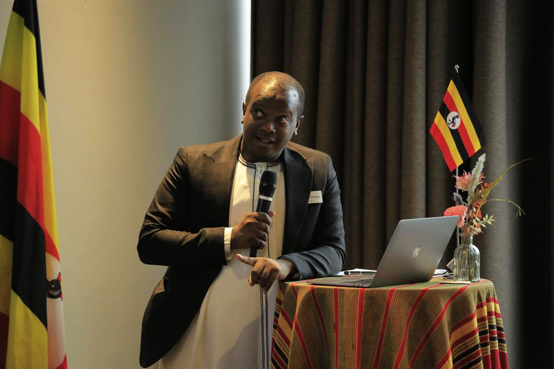 Daniel Irunga, the UTB senior brand officer addressing the  travel trade professionals, media representatives, and strategic partners in Denmark. (Courtesy photo)