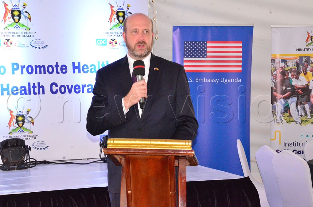 US Ambassador to Uganda William W Popp addresses guests during the launch of the Self care App at the health ministry headquarters. (Credit: Agnes Kyotalengerire)
