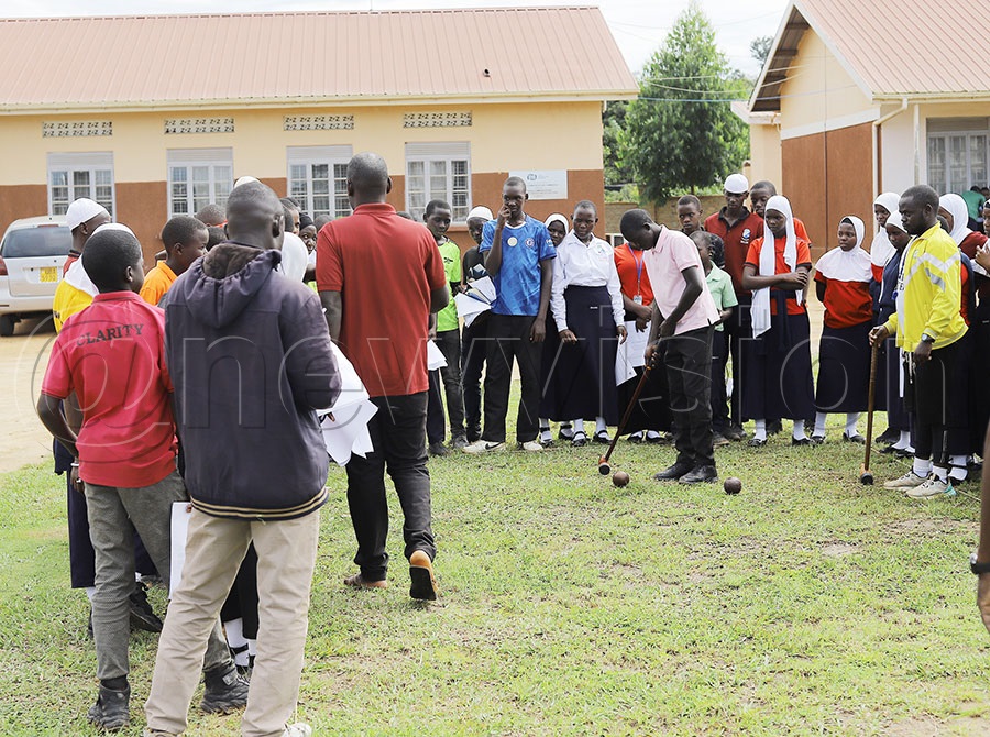Trainees practice during the woodball Training workshop at Mbirizi Secondary School in Lwengo District