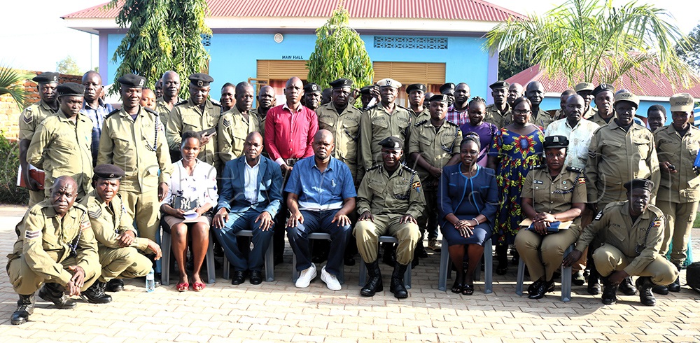 West Nile Regional Police Commander SSP Latif Zaake posing for a photo with other police officers after a one day training on Human Rights in Koboko. (Photo By Robert Ariaka)
