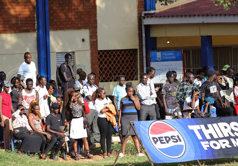 Nkumba University students watching the game against ISBAT