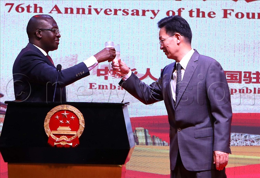 The Chinese Ambassador to Uganda H.E. Zhang Lizhong toasts during the Chinese 76th anniversary with the Minister of State for Foreign Affairs in charge of Regional Affairs John Mulimba during the celebrations at Sheraton Gardens in Kampala on September 26, 2025.