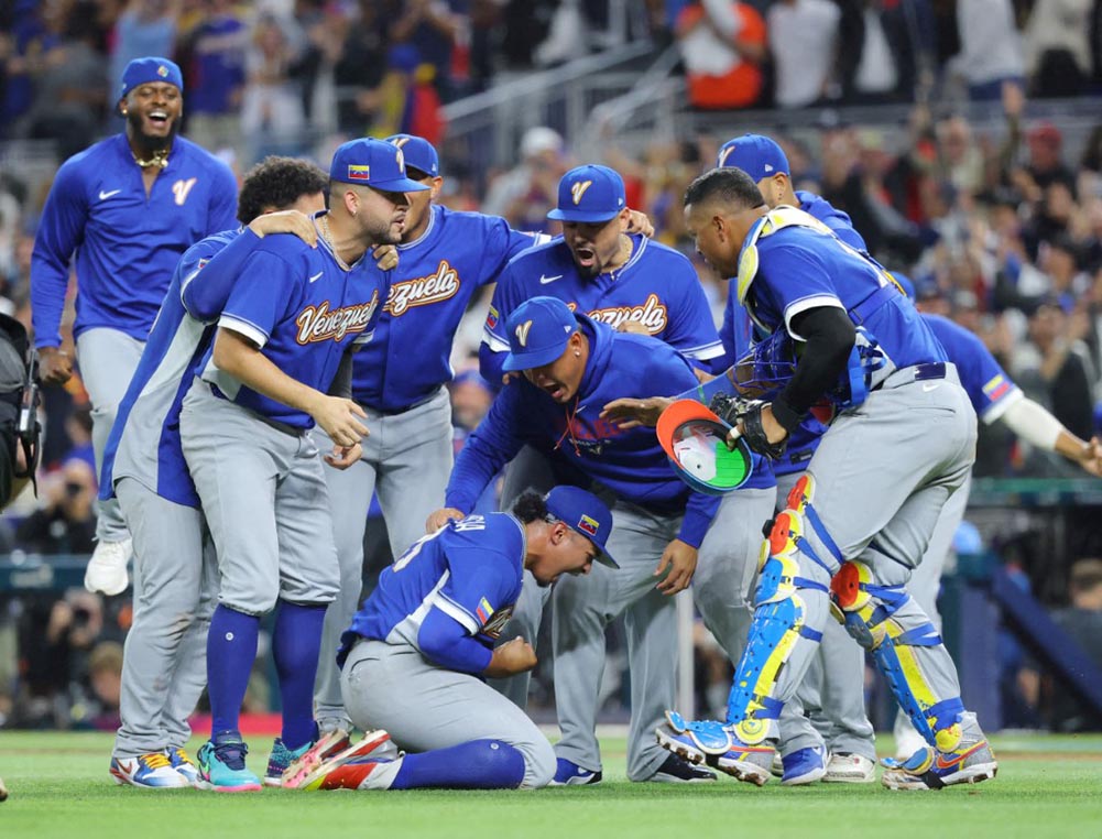 Venezuela's National Team members celebrate following the victory over the U.S.A. during the World Baseball Classic (WBC) final at LoanDepot Park in Miami, Florida, United States on March 17, 2026.