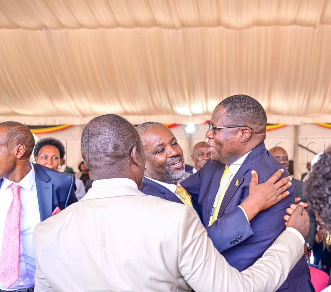 Outgoing deputy Speaker of Parliament, Thomas Tayebwa, congratulating Oboth-Oboth. (Credit: Miriam Namutebi)