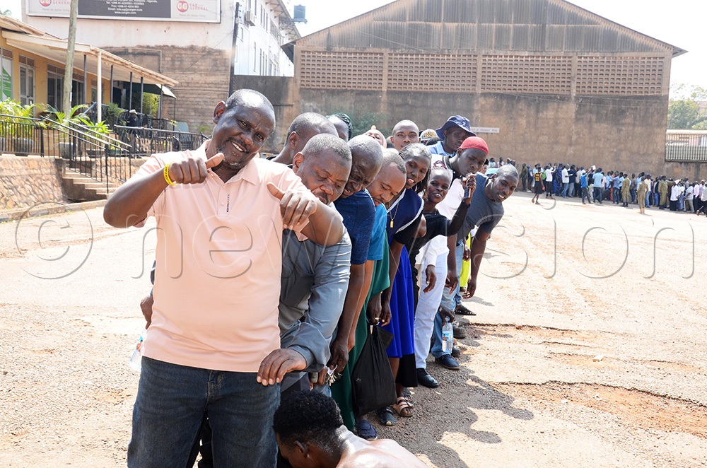 Samuel Aliku, who was declared the winner for Pepsi Cola village lining up during the voting exercise at Pepsi Cola village yard in Kampala on Tuesday, July 28, 2026 (Photo by Isaac Nuwagaba)