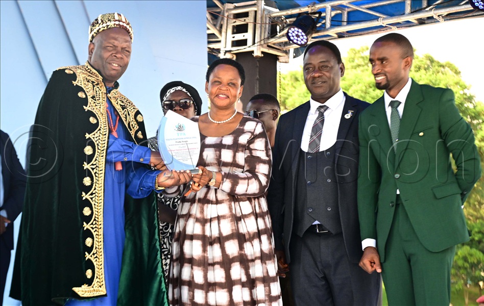 His Royal Highness Chief Chamuka VI republic of Zambia receives a plaque of good leadership to from  Youth Platform Africa Patron Col. Edith Nakalema, Board Chairman Youth Platform Africa Eng. Kambugu Kyeyune Peter and MD Youth Platform Africa Obed Ben. This was during the commemoration of 18 years of YPA at Kololo Independence Grounds on May 22, 2026.