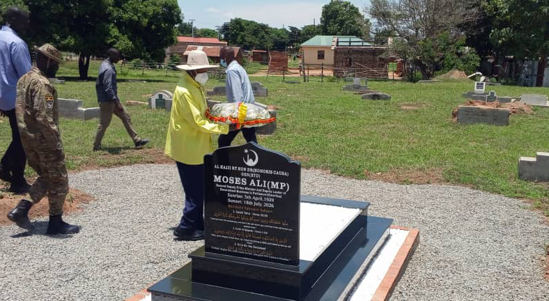 President Yoweri Museveni visiting the grave of former Member of Parliament for Adjumani West constituency, the late Gen. (rtd) Moses Ali, where he laid a wreath. (Credit: Doreen Tasia)