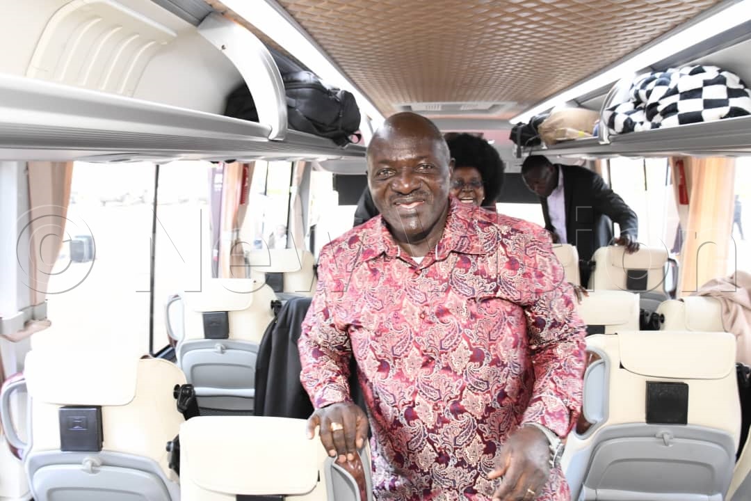 Gen. Katumba Wamala inspecting the Kiira Motors-Kayoola bus. (Credit: Mpalanyi Ssentongo)