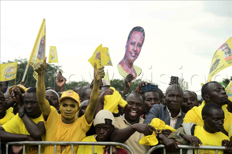 Jubilant NRM supporters display the First Lady's portrait as she arrived for a rally in her home Ntungamo district.