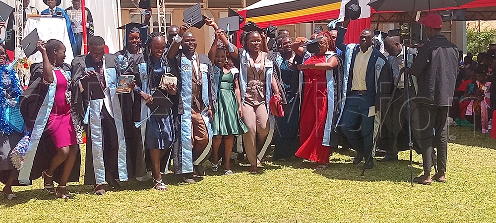 Graduates show happiness. (Credit: Juliet Akello)