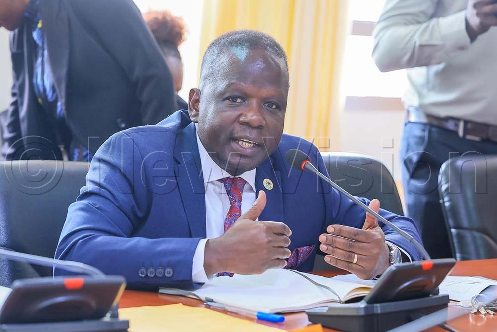 The speaker's guests in his boardroom also included Herbert Edmund Ariko, the chairperson of the House Committee on Public Service and Local Government. (Credit: Maria Wamala)