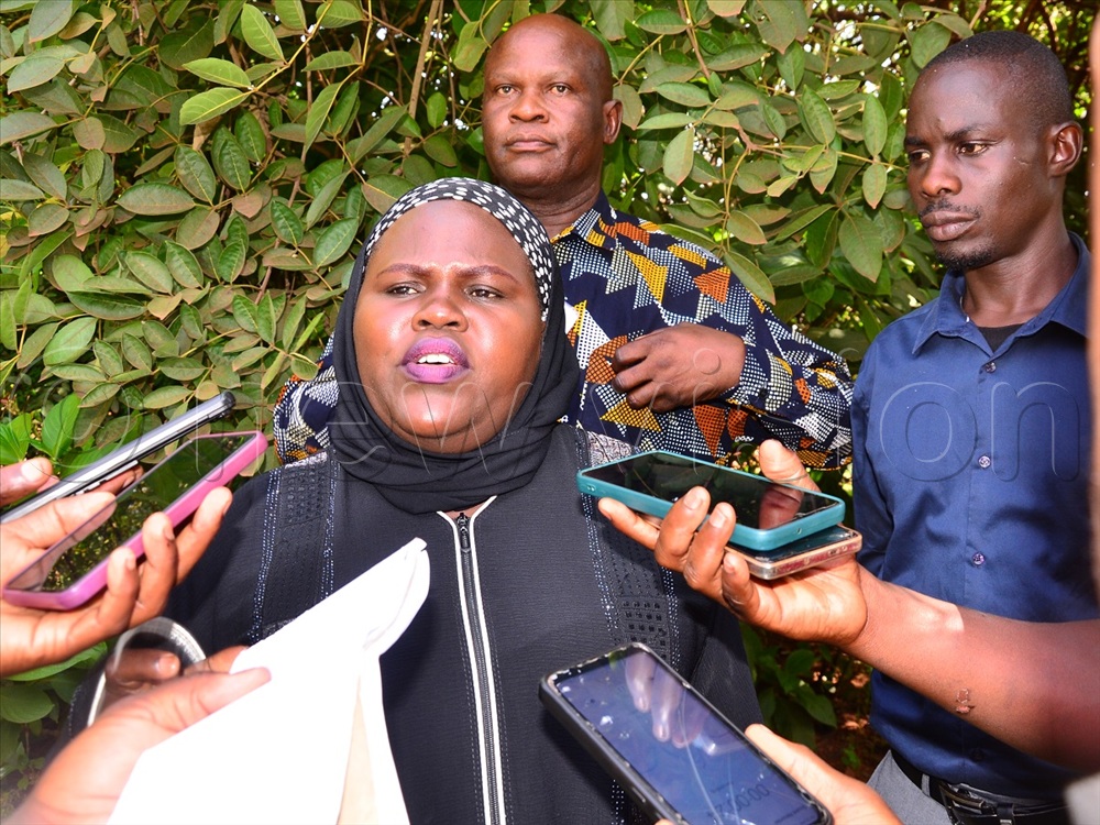 Sirina Kyakuwaire, the Jinja city deputy speaker who lost the Mafubira ward flag speaking to journalists.