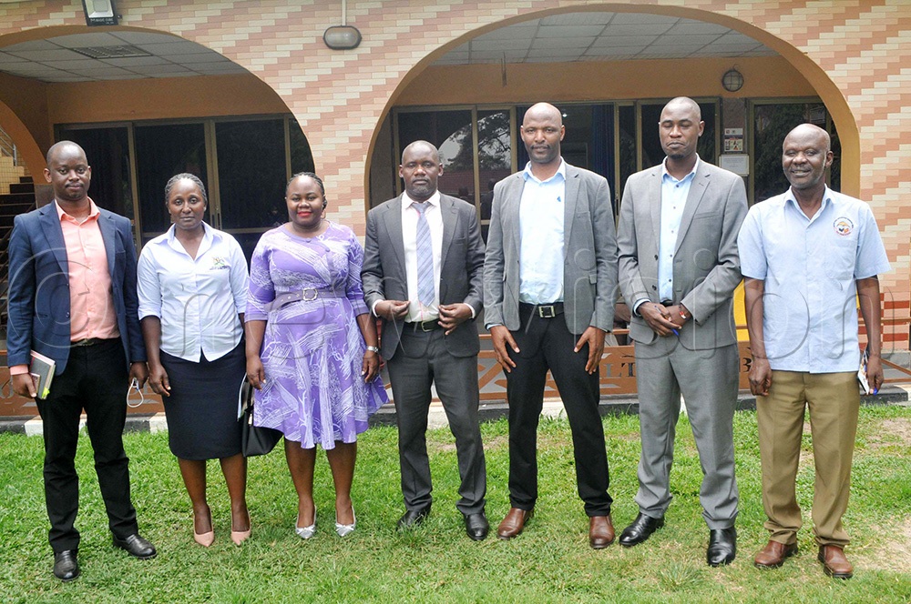 Gideon Mugulusi (centre), the Chairperson of the Uganda National Planners Union, with some of the guests at the annual general meeting of the Planners Union at Africana on 18th August 2026. (Photo by Nicholas Oneal)