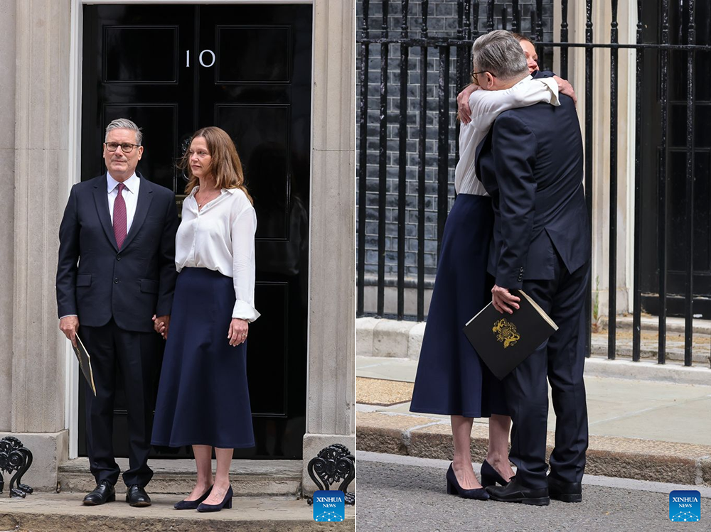 British Prime Minister Keir Starmer hugs his wife in London, Britain, on June 22, 2026.