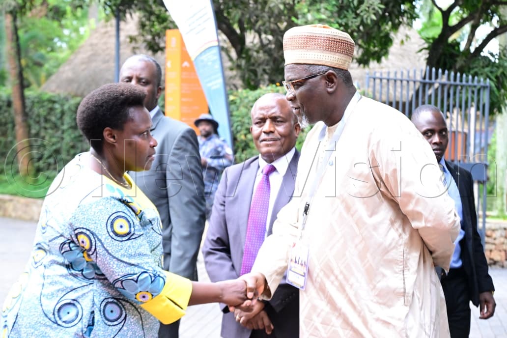 VP Alupo greeting Sanusi Tejan Savage, Chief of Mission IOM Uganda.