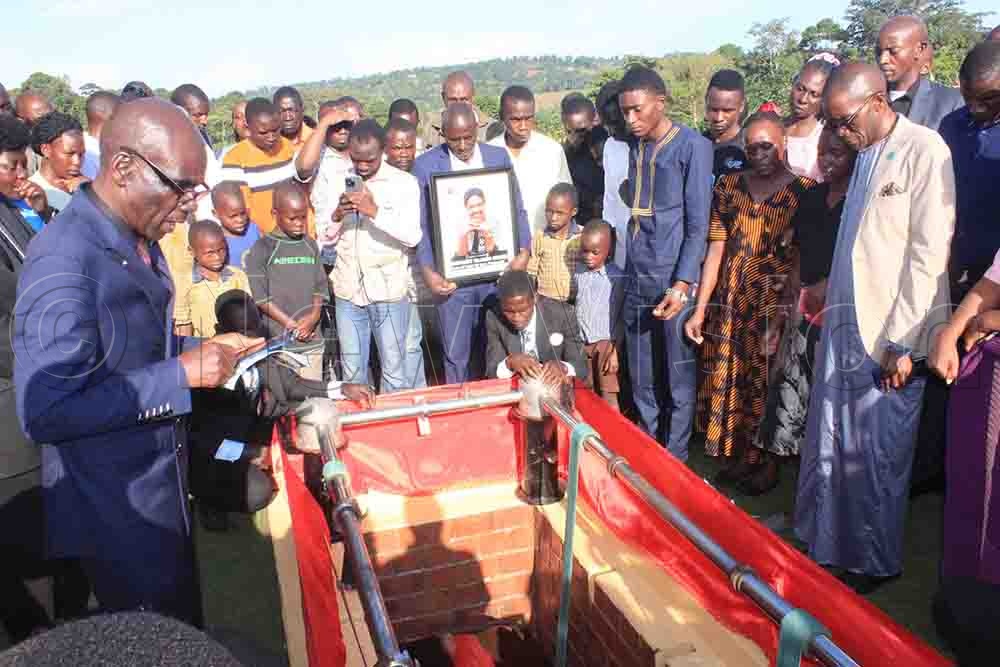 The wife of Adventist pastor and former Vision Group journalist Apollo Mubiru, Najjuma was buried in Seeta-Nazigo village in Nakisunga sub-county. (All Photos by Henry Nsubuga)