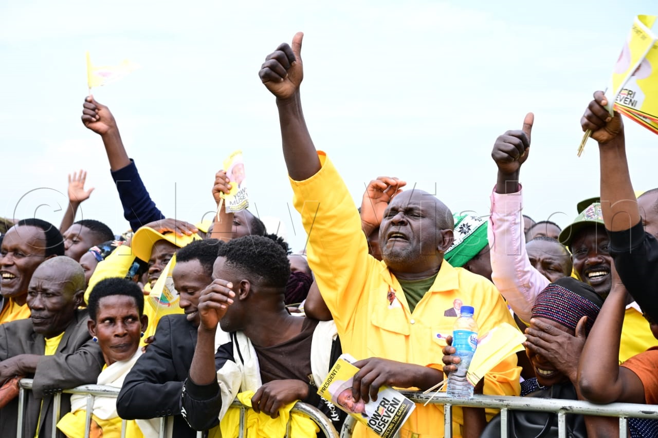 NRM supporters cheering Kalungu East NRM parliamentary flag bearer, Vincent Ssempijja, after receiving his flag from president Yoweri Museveni at Lukaya in Kalungu district. (Credit: Eddie Ssejjoba)