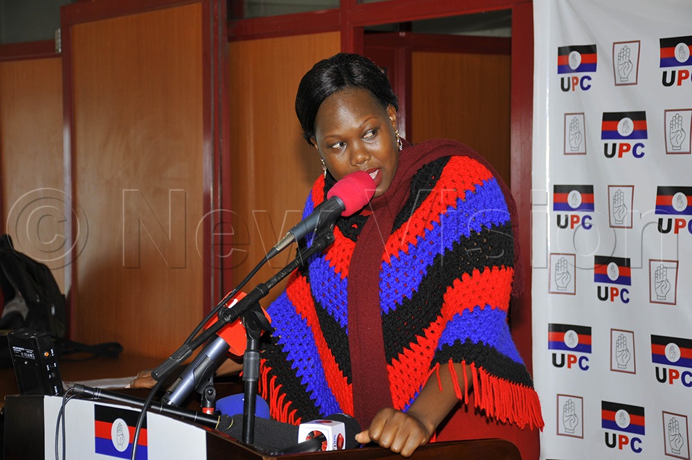 Spokesperson for UPC party, Oyat Sharon, addressing the press at the party headquarters, March 11, 2026. (Photo by Wilfred Sanya) 