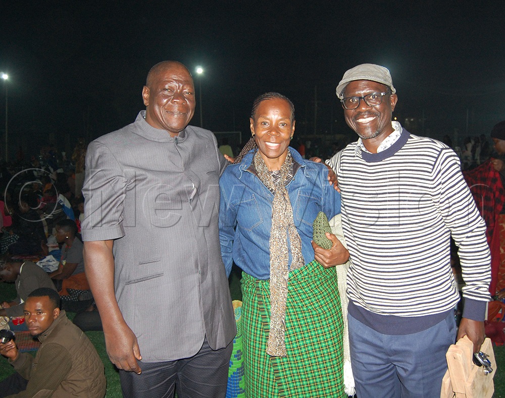 Vision Group&rsquo;s Deputy Editor-in-Chief Felix Osike (right) with family members during the New Year's Eve mass at YES Centre Sports Arena, Nsambya, in Makindye Division. (Photo by Mathias Mazinga)