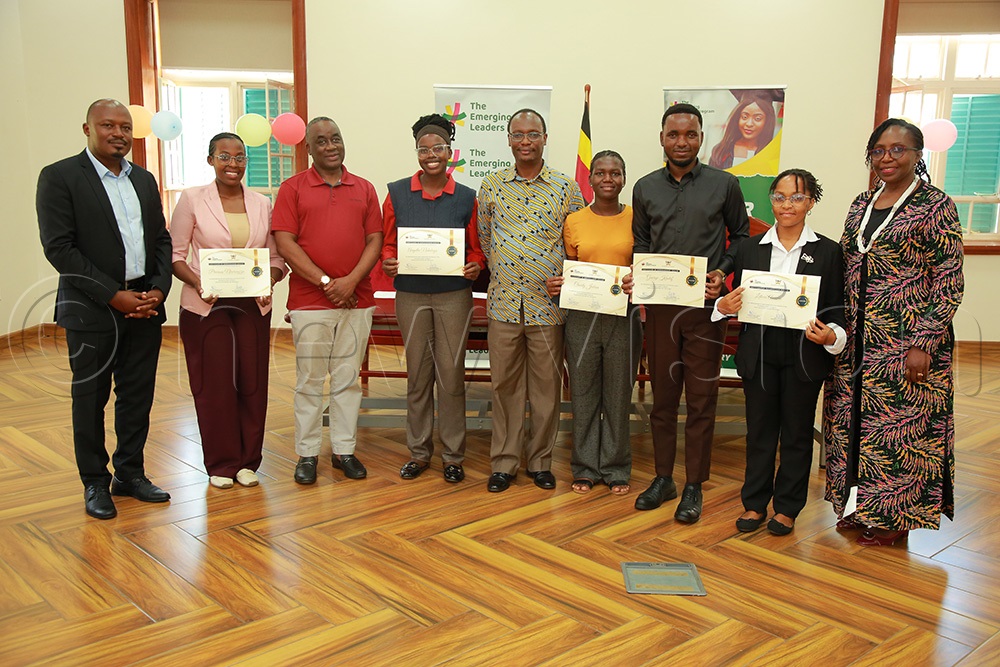 Some of the inaugural graduate of SAFE&ndash;iLead John Maxwell Leadership Programme at Makerere University pose for a photo with officials on Wednesday, May 3, 2026. (Photo by Nelson Kiva)