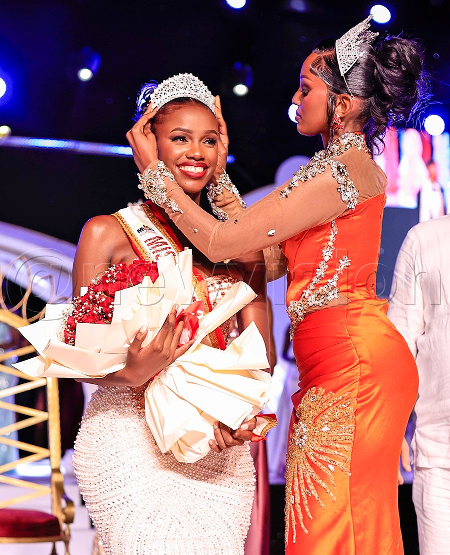 Trivia Elle Muhoza, the outgoing Miss Uganda, crowns Almorie Nagayi as Miss Uganda 2026&ndash;2027. Photo by Ignatius Kamya