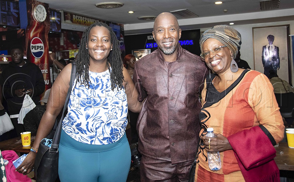 Ntare Guma Mbaho Mwine (middle), with Prof. Sylvia Tamale (right), and Clare Byarugaba, at the Premiere of his documentary, Memories of Love Returned, at the Century Cinemax, Acacia Mall on Friday evening. (PHOTO BY KALUNGI KABUYE)
