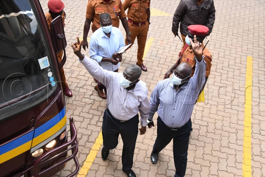 Besigye and his co-accused arrive at the Hight Court today. 