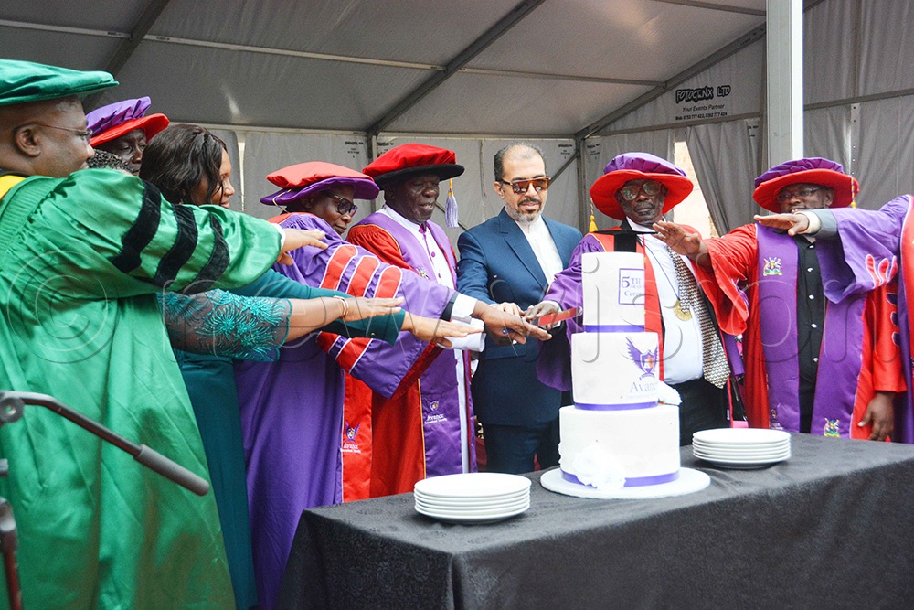 The King of Buruuli Kingdom, Isasabaruli Isabaarongo (second from the right) cutting a cake with the officials of Avance International University during the fifth graduation ceremony at the campus in Nabweru, Wakiso District, on Friday, September 25, 2026. (Photo by Francis Emorut)
