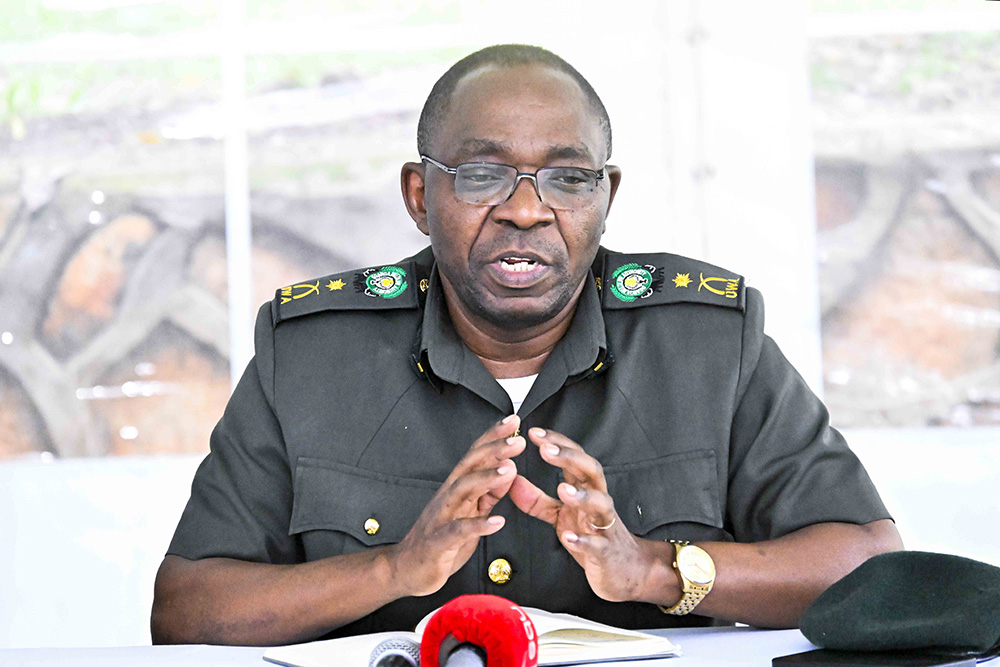  Uganda Wildlife Authority (UWA) John Makombo delivers his remarks during the meeting. (Photo by Tony Rujuta) 