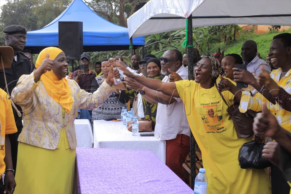 Minsa Kabanda, the NRM flagbearer for Kampala Central MP, interacting with party leaders and members at Nakasero Primary School play ground, during the launch of the grassroots campaign. (Photo by Jeff Andrew Lule)