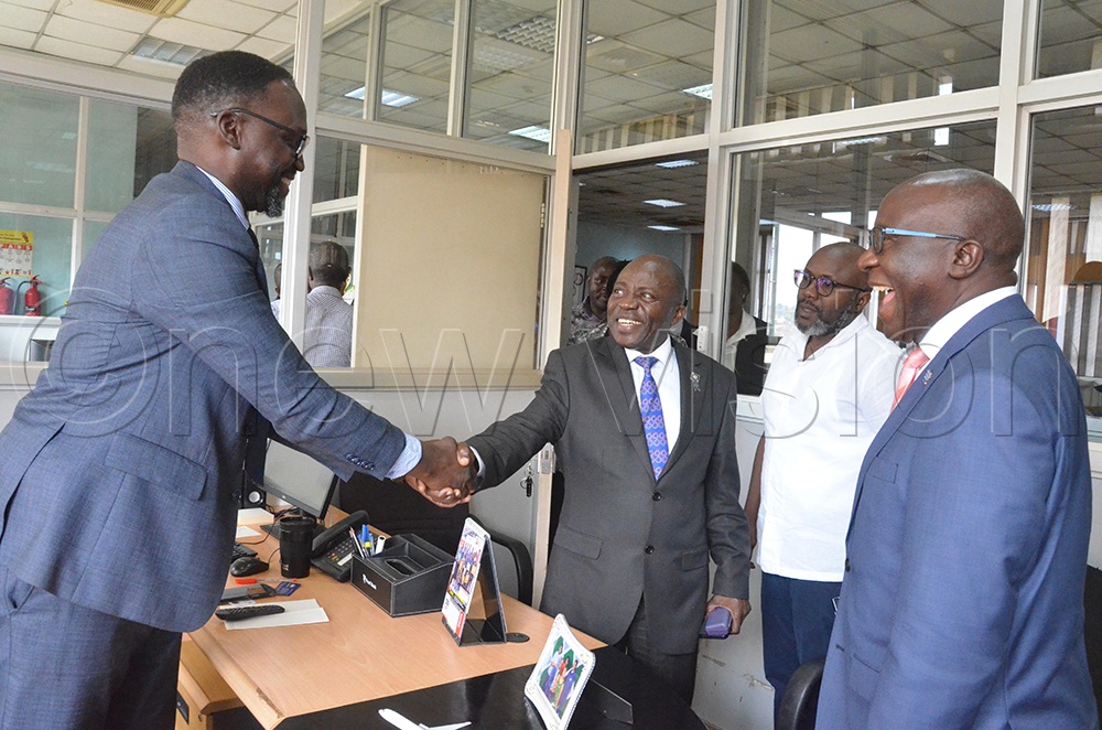 Vision Group Editor-in-Chief Sidney Miria Babanga welcomes Rotary Cancer Run Board Chairperson Stephen Mwanje as Vision Group CEO Don Wanyama and Rotary District 9214 Governor Daniel Mukasa Ddamulira look on at Vision Group’s head offices in Industrial Area, Kampala, on Wednesday, September 23, 2026. (Photo by Isaac Nuwagaba).