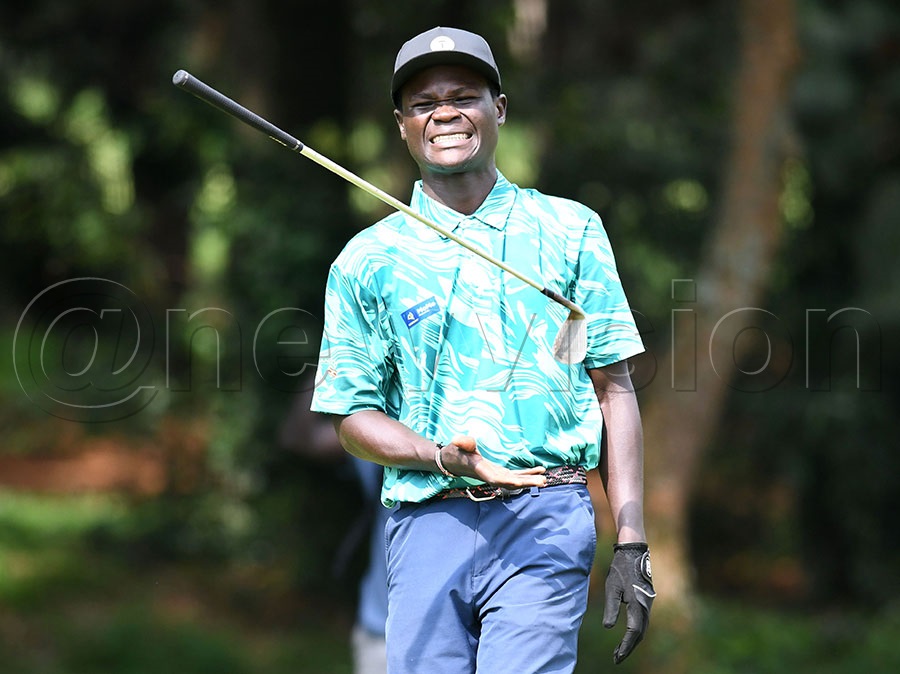 Uganda's Joseph Akena toasts his putter after missing a birdie chip on hole-6 during the Victoria Cup action at Entebbe Club, March 6, 2026. Photo by Michael Nsubuga
