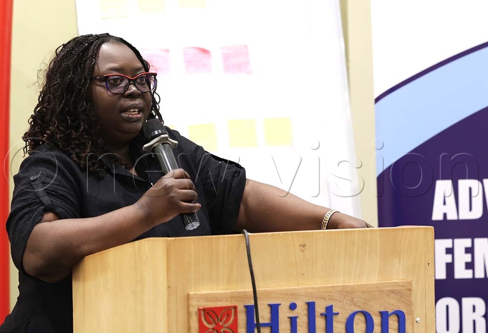The UWONET Executive Director Ritah Aciro, speaking at the meeting. (Credit: Jeff Andrew Lule)