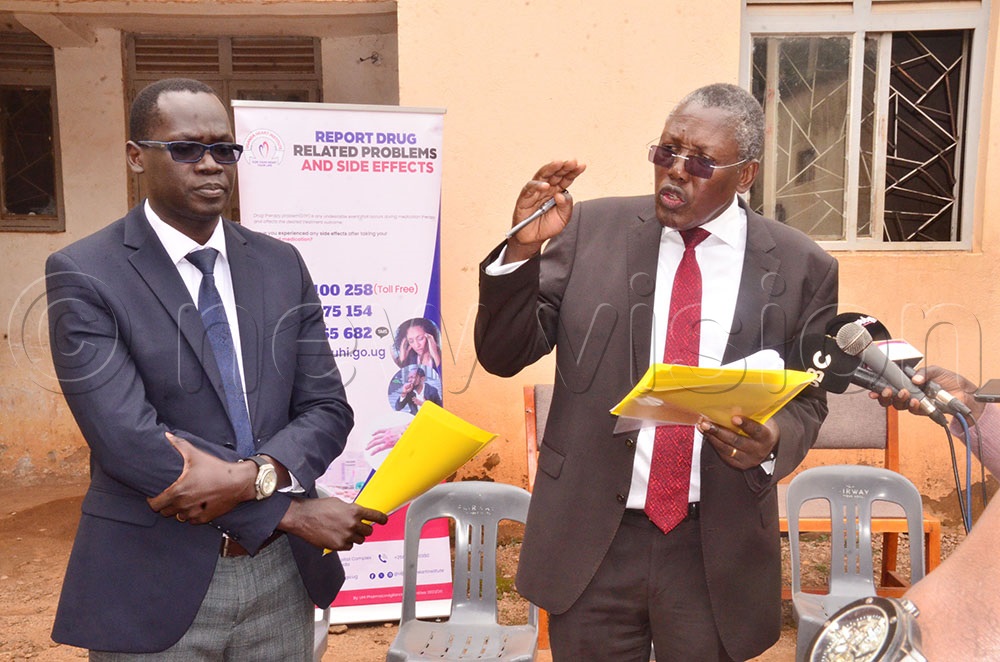 The executive director of Uganda Heart Institute Dr John Omagino addressing journalists at Wandegeya Police station. Looking on is Dr Emmy Okello a cardiologist at Uganda Heart Institute.(Photo by Agnes Kyotalengerire)