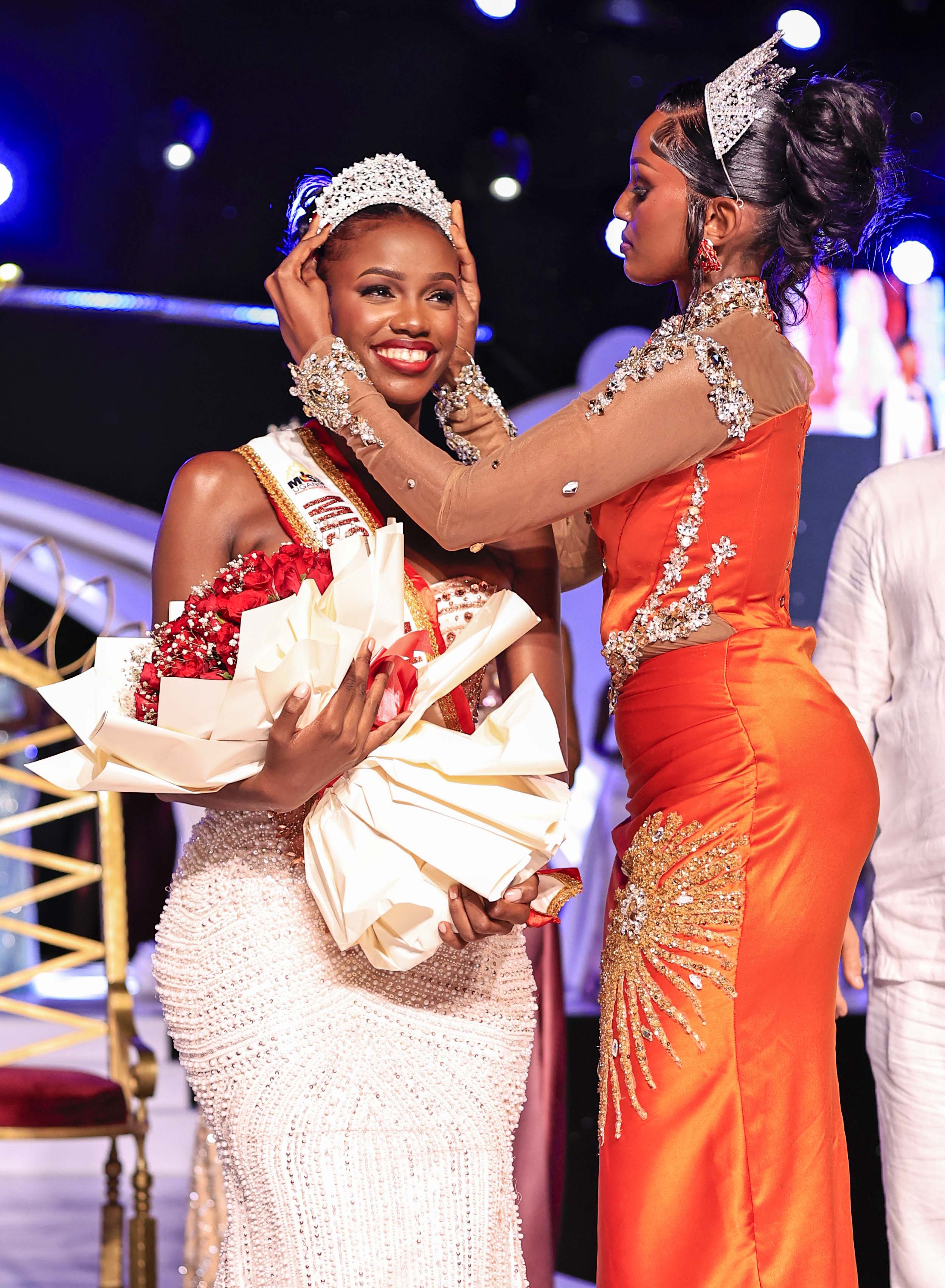 Trivia Elle Muhoza The Former Miss Uganda Crowning Almorie Nagayi As Miss Uganda 2026 To 2027. Photo By Ignatius Kamya