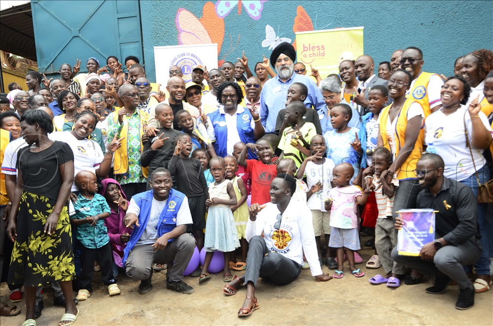 A.P Singh, Lion’s International President, Sangeeta Jatia, Past International Director, Tush Naturinda, district governor of district 411B, John Bosco Ntangaare, District Lions Clubs International Foundation Coordinator pose for a photo with children suffering from cancer and other Lion club members during a meeting at Bless a Child Foundation in Bwaise on 23rd September 2025. 