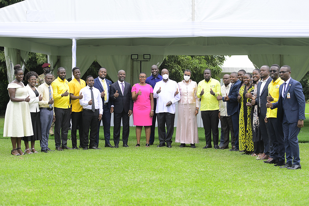 President Museveni, the First Lady, Maama Janet, the deputy speaker, Thomas Tayebwa, joined in a group photo by other guests at the National Prayer Breakfast. (PPU)