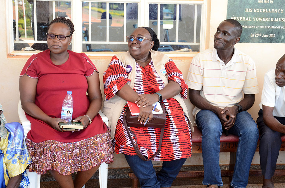 (L-R) Betty Irene Tamwizanga, the Luuka District Labour Officer, Margaret Mugisa, the Project Manager at Amref Health Africa Uganda and Andrew Ssemata, a Senior Research Scientist at Medical Research Council during he official handover of the wheelchairs at the district headquarters on May 7, 2026. (Credit: Lawrence Mulondo)