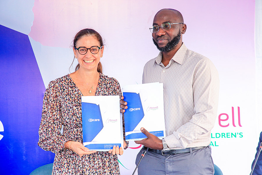 H&eacute;l&egrave;ne Echevin (L), CEO, C-Care International, and Dr. Malik Ssempebwa (R), Founder, Roswell Hospital