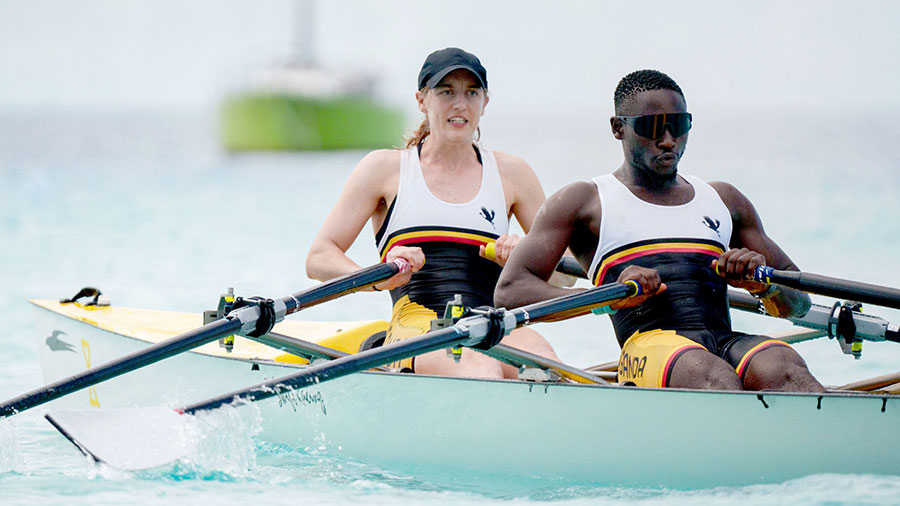 Kathleen Noble (left) and Elijah Namunyu in action during the Commonwealth Rowing Association Beach Sprints in Bridgetown, Barbados. Credit: CJ Taylor/Swift Racing